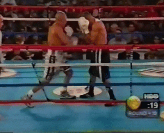 Wright shows how to block punches, slip, and pull in combination